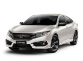 Honda Civic Sport 2018, com grade em preto perolizado.