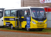 GranMini sobre chassi Volkswagen exposto da feira Agrishow 2015, no stand da Comil Silos, como ônibus para transporte rural (foto: LEXICAR).