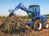 Para aumentar a penetração no segmento sucroalcooleiro a New Holland preparou esta carregadora de cana sobre o trator TS6000.