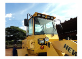 Motoniveladora New Holland com cabine Agro Lima.